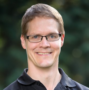 Head shot Mark pro crop.jpg