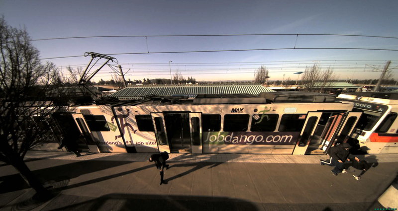 light-rail-platform-passengers-exiting-side-view-Theia-SY125-ultra-wide-angle-no-distortion-lens.jpg